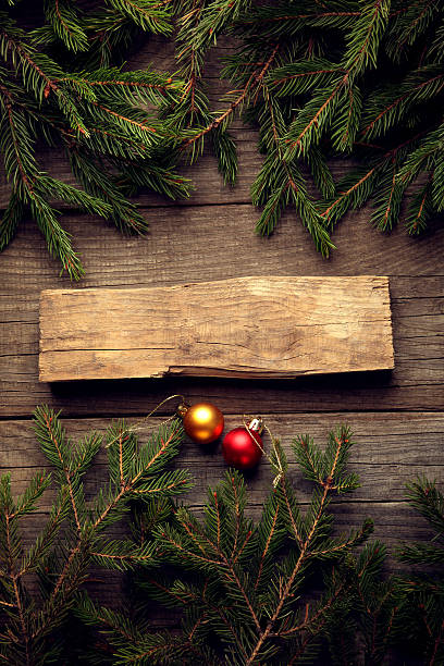 istock Christmas Tree and decorations on wooden background 626066782