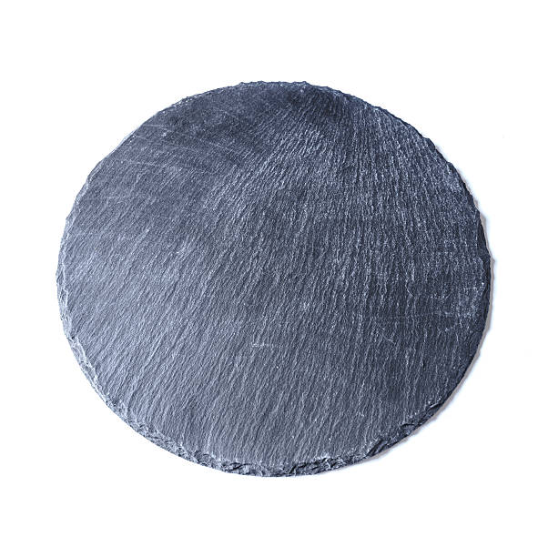 istock Natural black slate dish, isolated on a white background 626066836