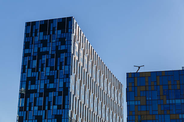 istock Modern office building with blue glass facade futuristic. 626067364