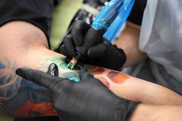 istock Tattoo Studio. Decorating the skin tattooed. 626067752