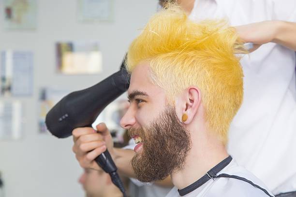capelli gialli divertenti - men hairdresser human hair hairstyle foto e immagini stock