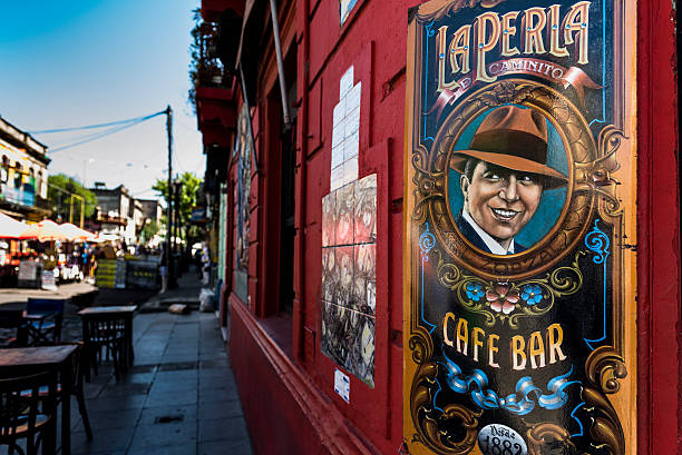 Buenos Aires, Argentina - October 29, 2016: View of a wall painting at a cafe bar building and the streets of the famous La Boca district, a neighborhood of Buenos Aires in Argentina