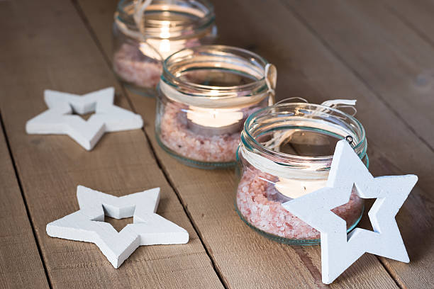 istock Tea lights in jars with salt,Christmas, New Year, advent 626070382