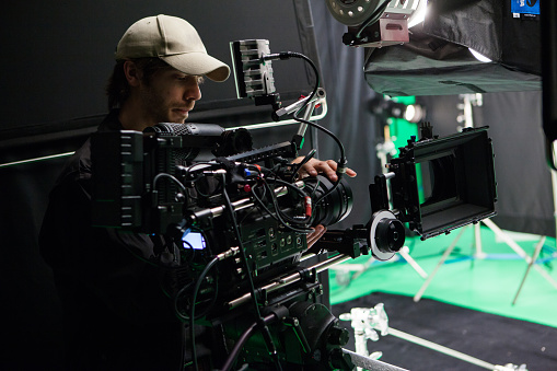 Camera film set on the tripod in the studio