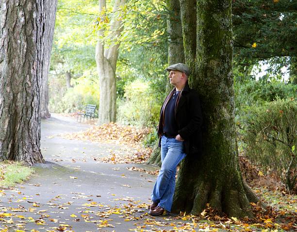 istock mature man in park 626074102