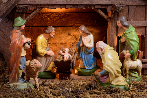 Christmas crib shows the nativity scene in stable in Bethlehem with Jesus
