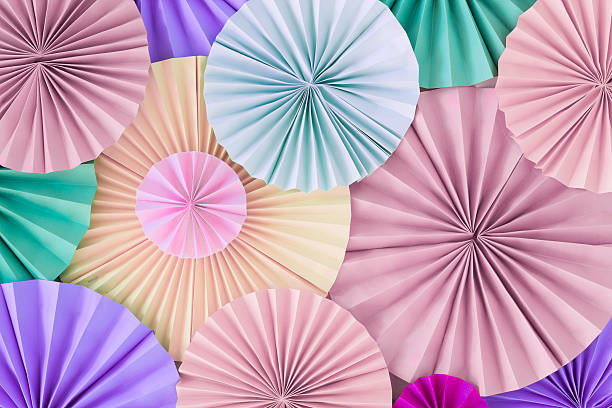 istock Pastel romantic background wall with multicoloured paper circles 626075878