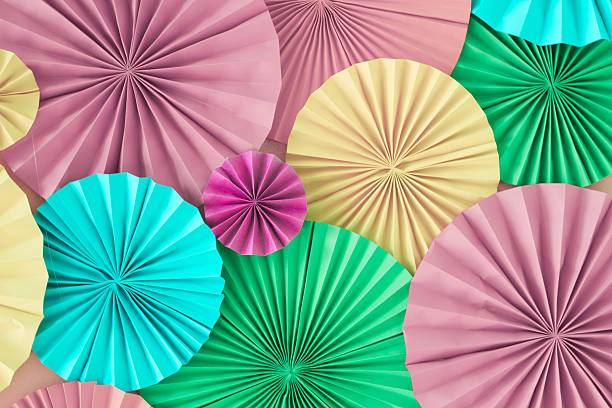 istock Colorful celebration pastel background wall with versicolored paper circles 626076058