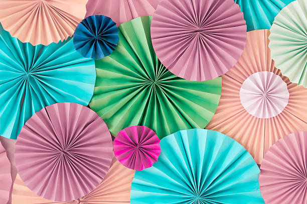 istock Colourful pastel romantic background wall with multicoloured paper circles 626077270
