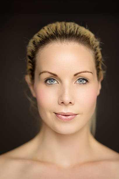 istock Studio portrait of attractive woman 626085636