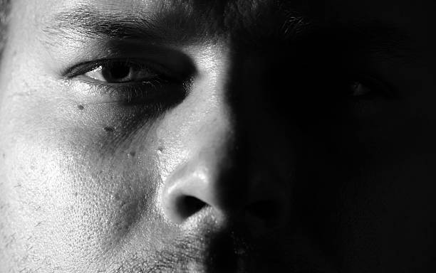 istock Portrait of young man monochrome 626087512