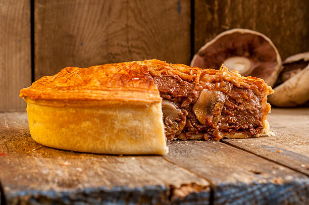istock Sliced Meat Pie with Mushrooms 626087600
