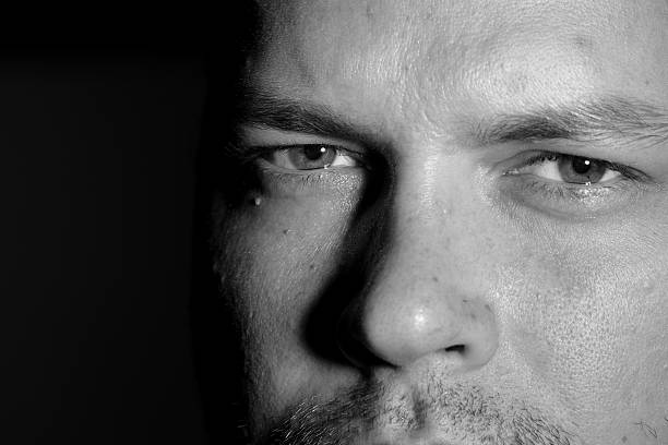 istock Portrait of young man monochrome 626087710