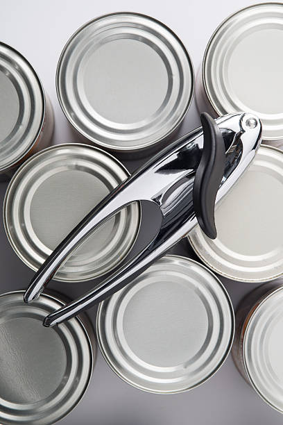 istock Overhead Shot of Can Opener on Tin Cans 626088118