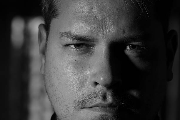 istock Portrait of young man monochrome 626088228
