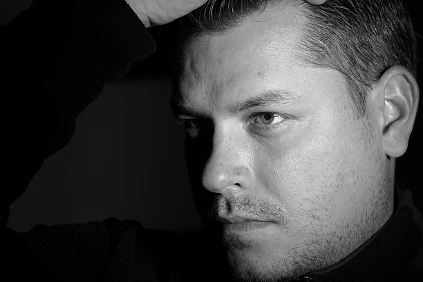 istock Portrait of young man monochrome 626088506