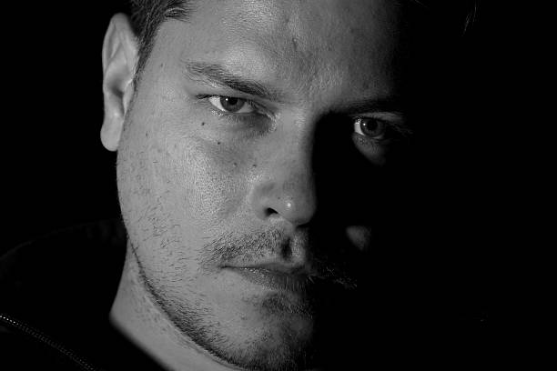 istock Portrait of young man monochrome 626088558