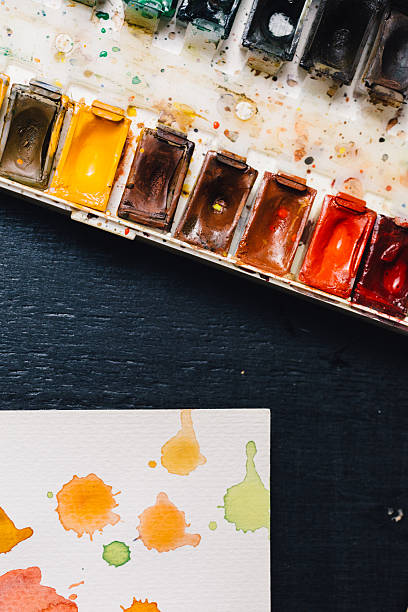 istock Crop view of watercolor palette and brushes 626088608