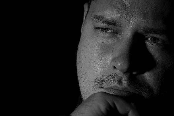 istock Portrait of young man monochrome 626088614