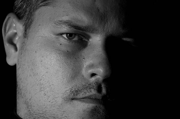 istock Portrait of young man monochrome 626089324