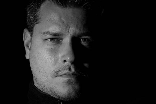istock Portrait of young man monochrome 626089414