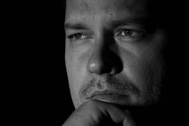 istock Portrait of young man monochrome 626089498