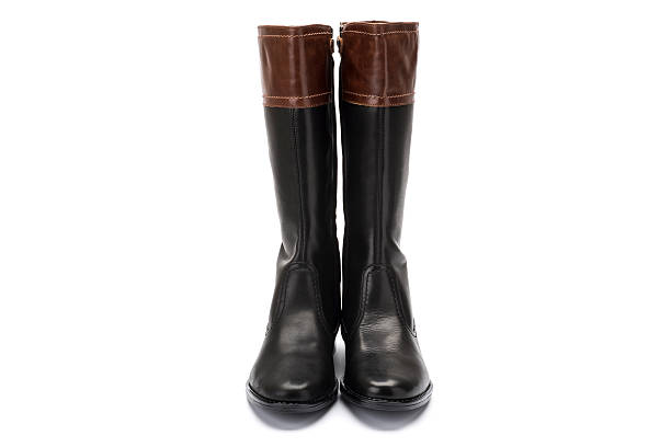 istock brown and black leather childrens boot on white background 626089584