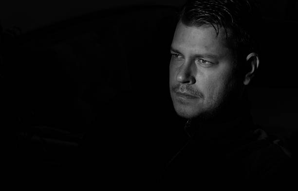 istock Portrait of young man monochrome 626090540