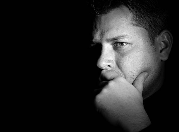 istock Portrait of young man monochrome 626090714