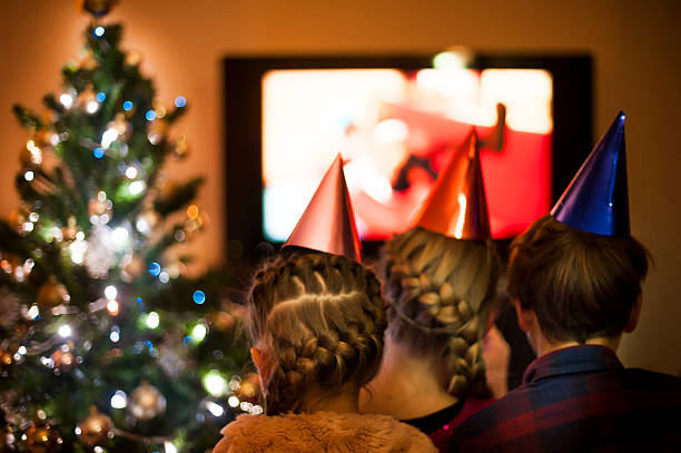 istock Children Watching TV on a Christmas Eve 626096208