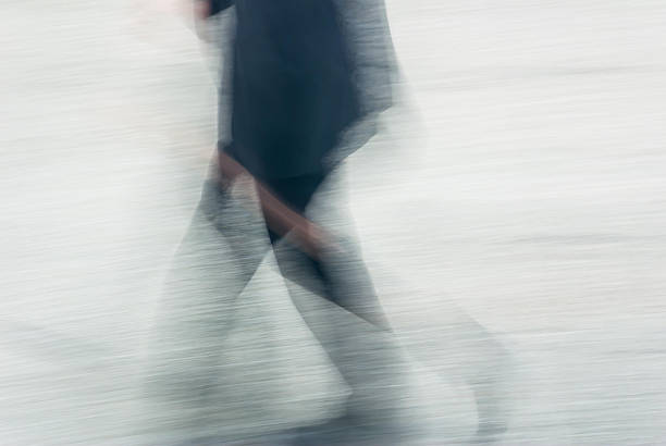 istock man walking in a street 626099198