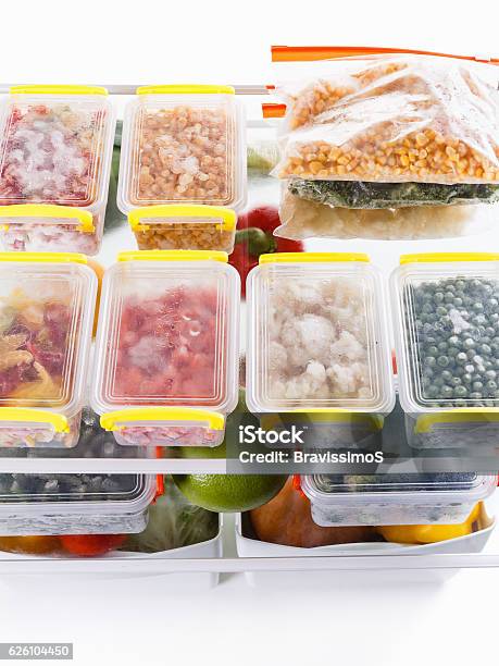 Frozen Food In The Refrigerator Vegetables On The Freezer Shelves Stock Photo - Download Image Now