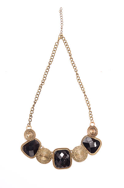 istock Necklace with black stones isolated on white 626104604