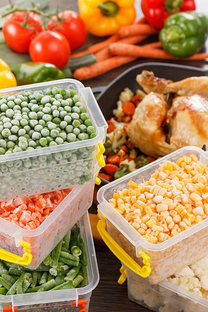 istock Frozen vegetables and fried chicken, paleo diet food 626119826