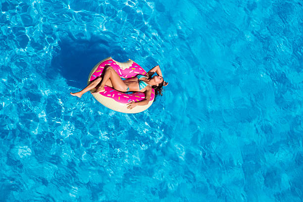 istock Hispanic Brunette Model At The Pool 626122238