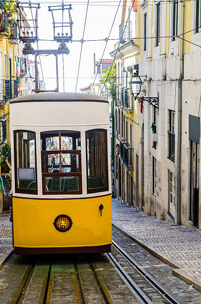 istock Yellow and white tramway stopped at top of hill 626132522