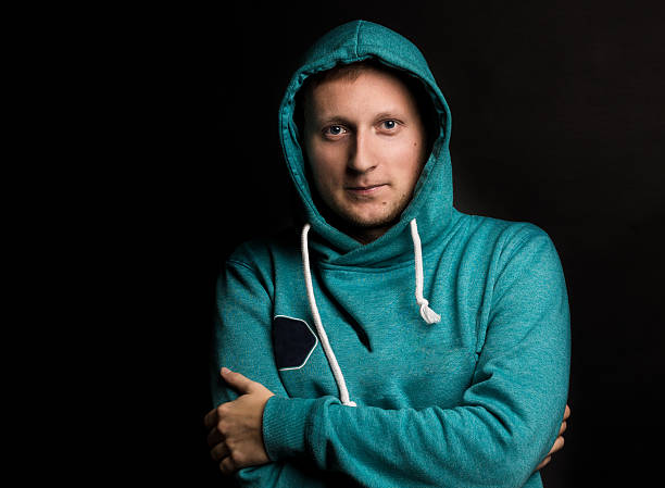 istock caucasian man dressed in a blue jacket with a hood 626132814