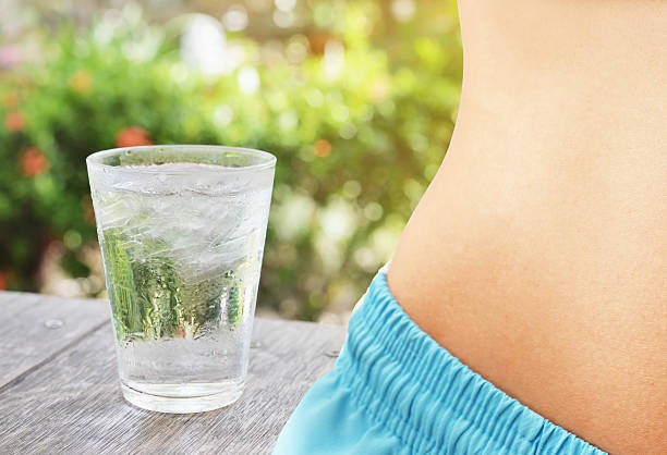 istock thin slim body woman with water 626134128