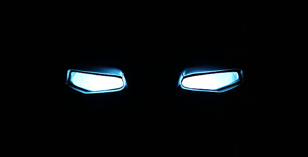 istock Abstract a robot Glowing eyes in in the dark 626135134