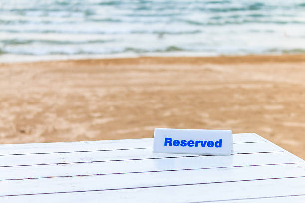 istock The seaside table with beach and sea background has reserved 626136280