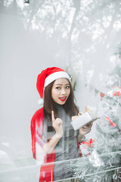 istock Christmas woman with nice present 626144380