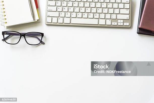 Office Desk Table With Computer Keyboard Stock Photo - Download Image Now - Desk, Cityscape, Looking At View