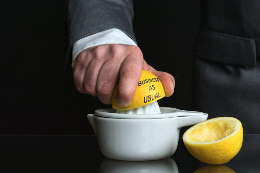 Concept for Business as usual with Lemon and a Man