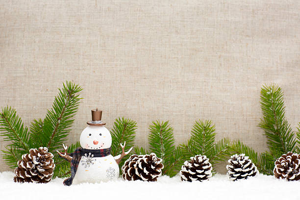 istock Christmas still life has  pine cones and the snowman. 626151928
