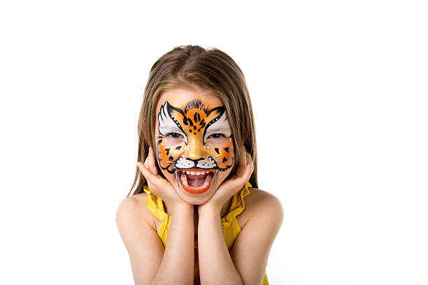 istock cute little girl with painted face 626152606