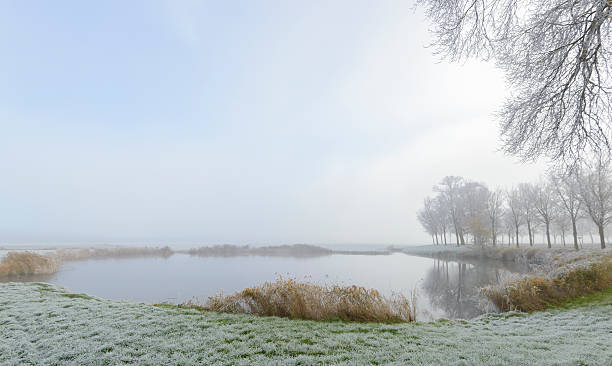 istock Frosty winter landscape during an early misty morning 626154708
