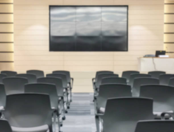 istock Motion blur of empty seminar room 626156374