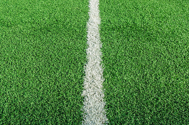 istock fake grass soccer field and white single line 626157000