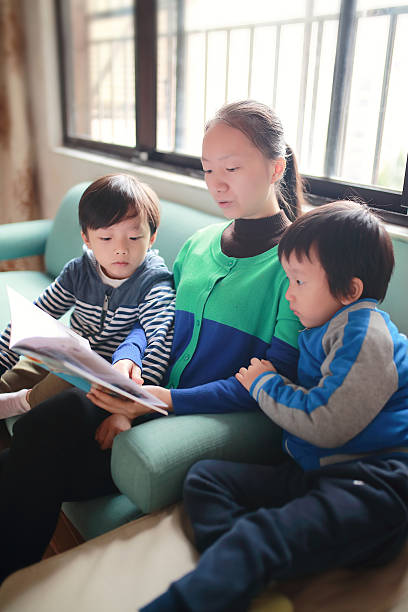 istock Reading a Book Together as a Family 626158706