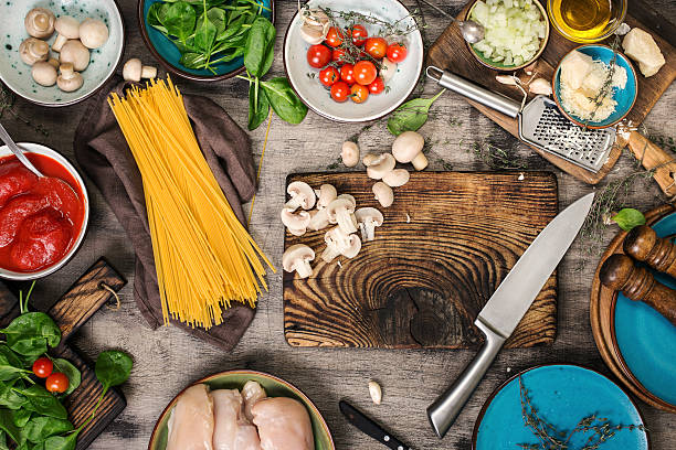 istock Raw Italian spaghetti and ingredients for cooking pasta 626162042